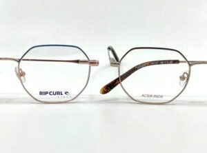 Duo de montures Rip Curl filles de forme hexagonale, en métal, disponibles chez Optique Place des Fêtes, votre opticien à Paris 19