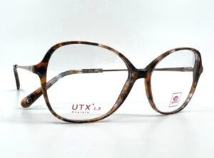 Lunette Rip Curl femme, face acétate écaille brun et bleu grande forme papillonante et branche métal, chez Optique Place des Fêtes, votre opticien à Paris 19