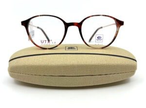 Lunette Rip Curl fille, face acétate écaille rouge forme pantos et branche métal, chez Optique Place des Fêtes, votre opticien à Paris 19