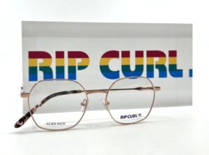 Monture optique Rip Curl fille, métal rose gold, distribuée par Optique Place des Fêtes, votre opticien à Paris 19